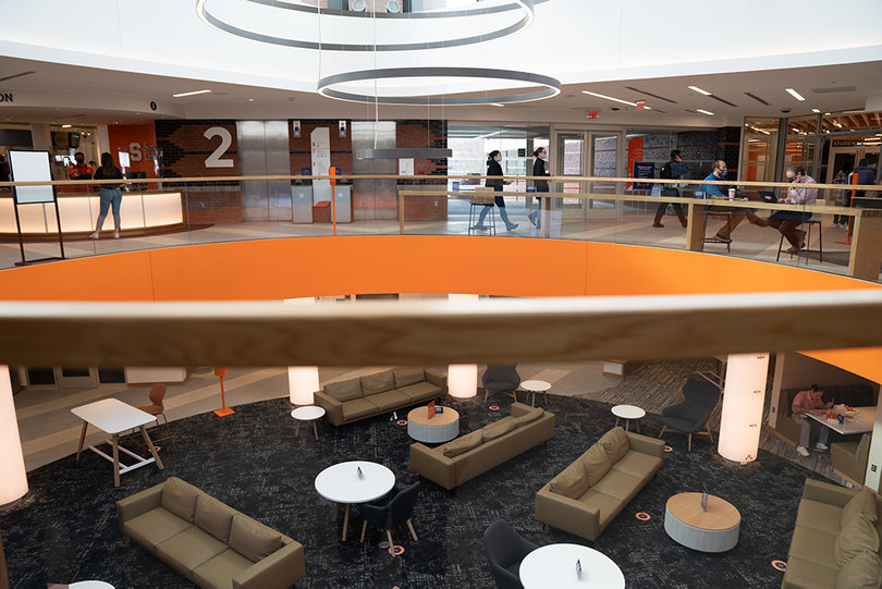 Students can look down at Schine's first floor lounge from the second floor balcony.