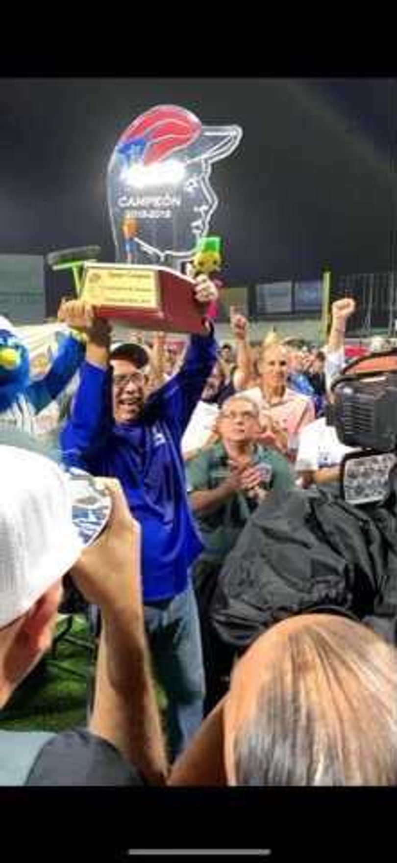 Justo Moreno Sr. hoisting the Puerto Rican Independent Baseball League 2018-2019 Championship Trophy. 