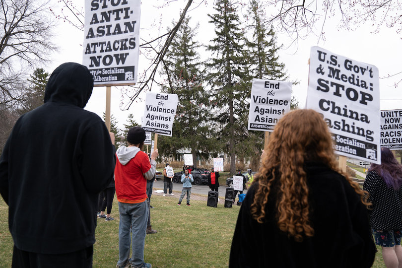 Kaitlin Maroney speaks to demonstrators at the rally against anti-Asian violence in Thornden Park.