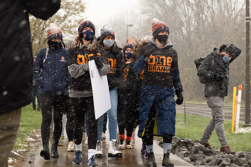 Athletes march.