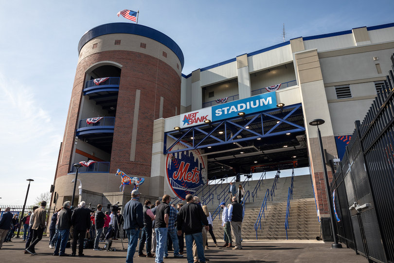 Fans gather outside NBT Bank Stadium to watch the ribbon cutting ceremony before entering the stadium.