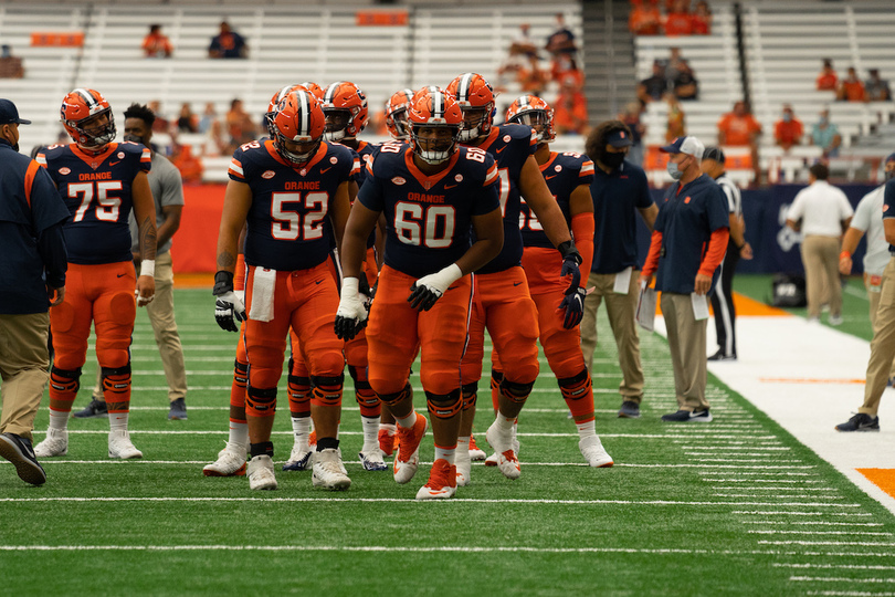SU defensive coordinator, offensive line coach will return in 2022