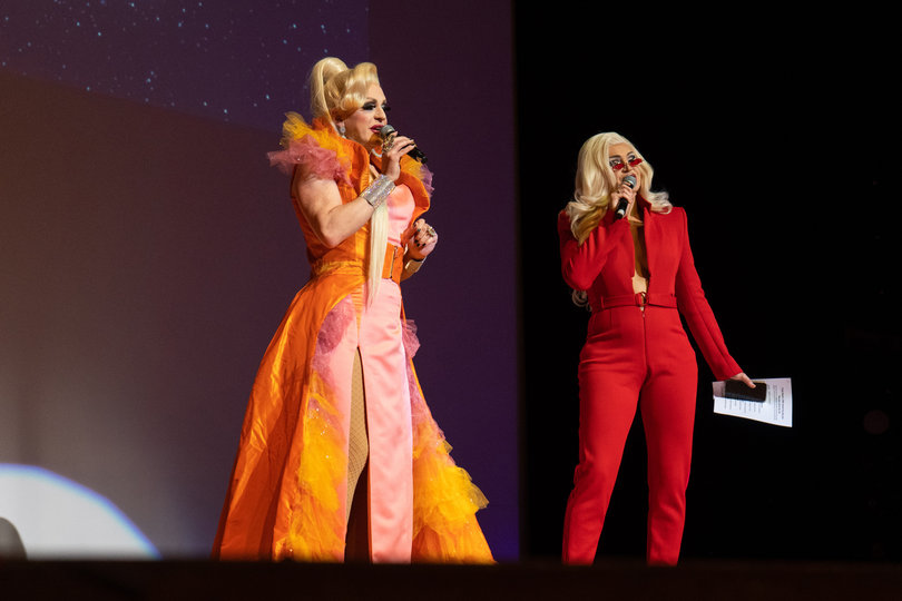 Hosts of the night of 20th Annual Drag Show Finals—Pandora Boxx (left) and Kylie Sonique Love—announce the contestants. 