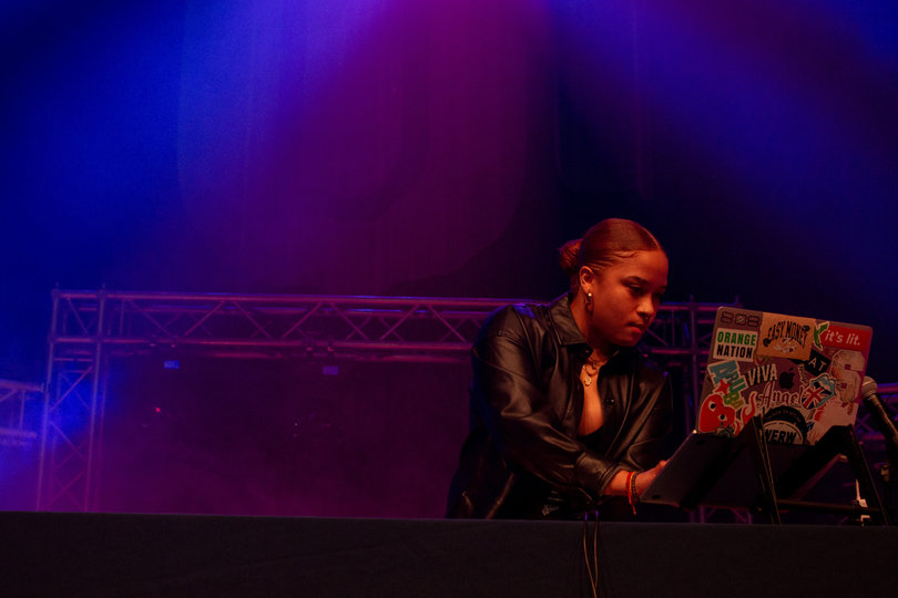 Student DJ, DJ Jill opens University Union Bandersnatch concert. 