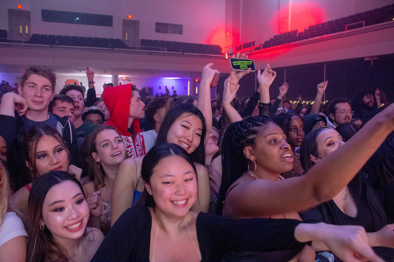 Students are excited to see the performers take the stage in Goldstein Auditorium. 
