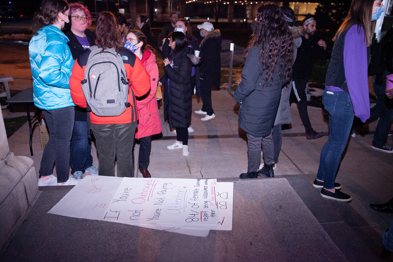 Take Back the Night event participants gather outside of Hendricks Chapel before taking to the streets of campus for the march portion of the event. 