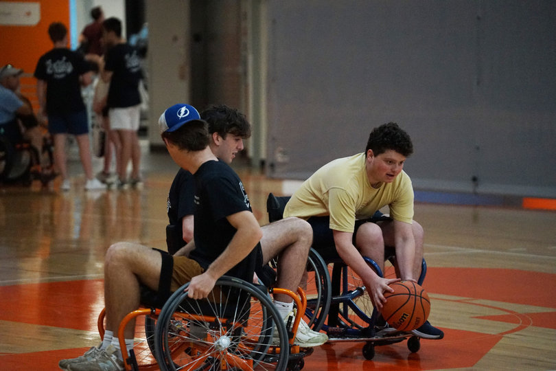 Members of fraternity Phi Kappa Psi played wheelchair basketball with community members. The fraternity partnered with MoveAlong Inc., a group whose mission is to promote inclusive sports in the Syracuse area, in order to host OrangeAbility. 