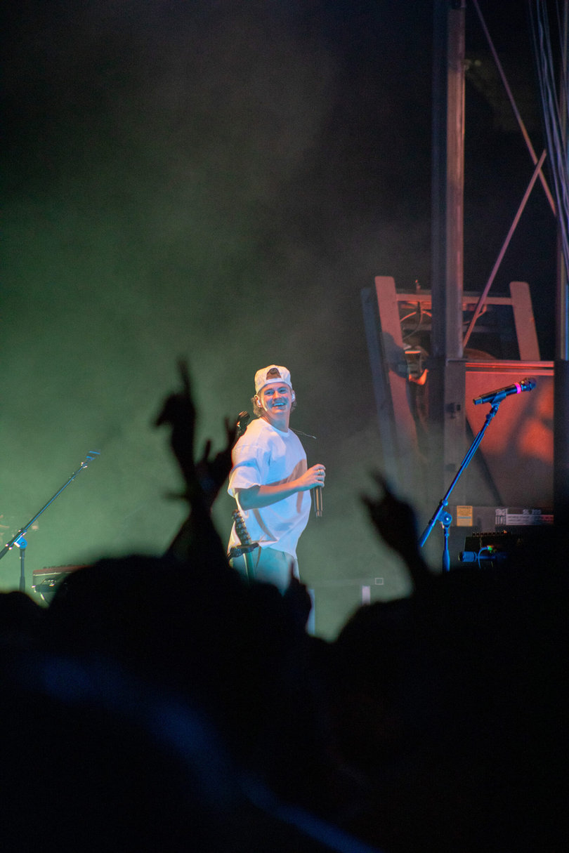Frank moves between both sides of the stage as he performs. He and Padalecki encouraged their fans to sing along and returned any waves and smiles that they received from those at the front.
