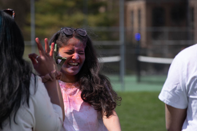 A participant smiling and covered in powder.