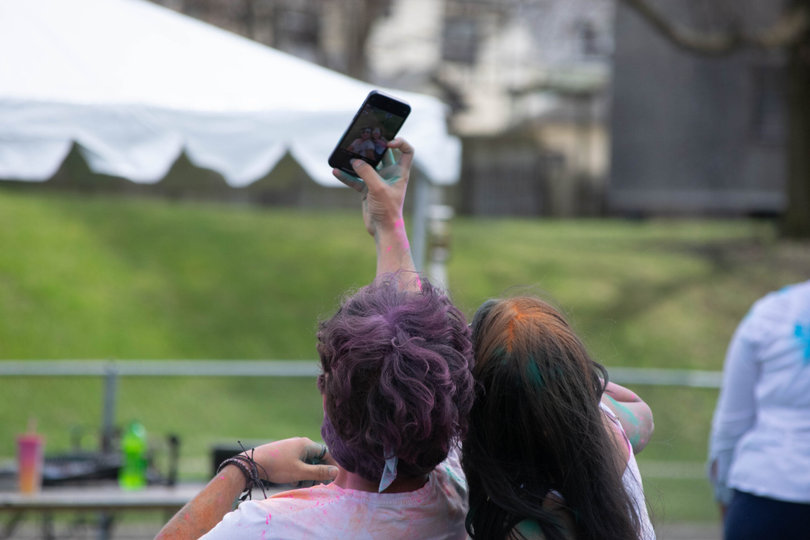 Two participants take a selfie.