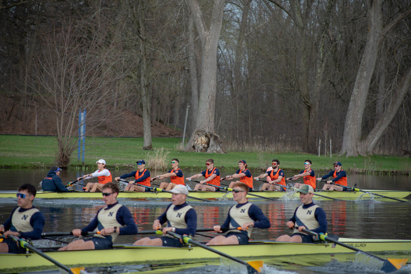 The Syracuse Varsity 8 behind the Navy varsity 8