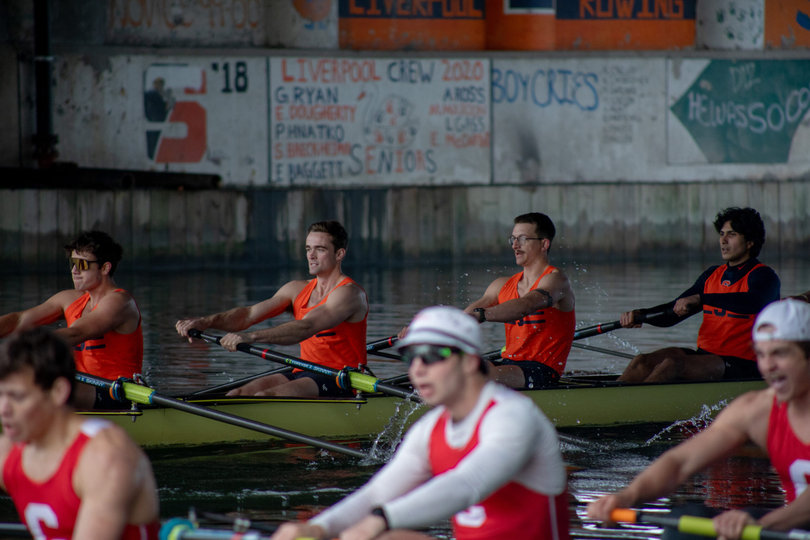 detail shot of four Syracuse rowers