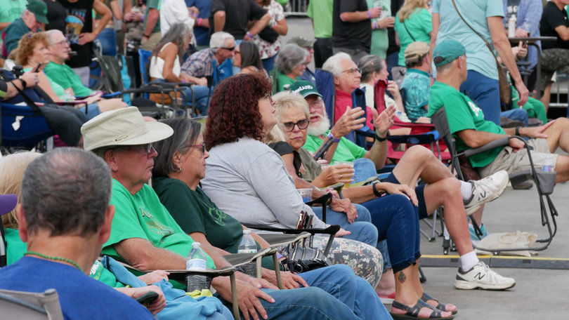 Festival attendees watch Attractive Nuisance’s performance on the event’s Clonakilty Stage. Many patrons wore green, a color that honors Irish nationalism. 
