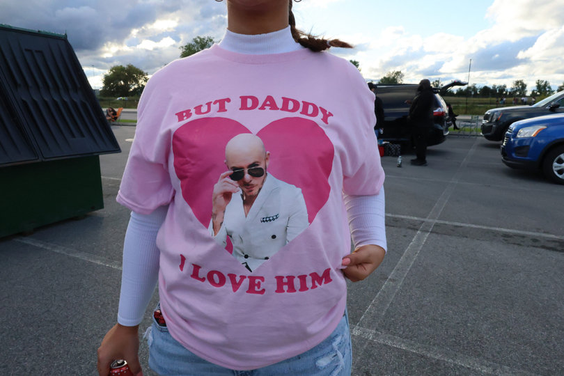 Fans showed their adoration for Pitbull with merchandise. One fan sported a t-shirt from Etsy with the phrase “But Daddy I love Him” accompany a portrait of Mr. Worldwide. 

