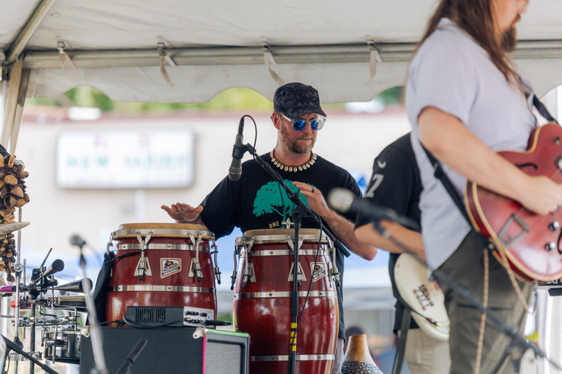 A drummer performs in a band at one of the fair’s six music venues. The Fair featured live acts to celebrate Syracuse’s local talent and culture.
