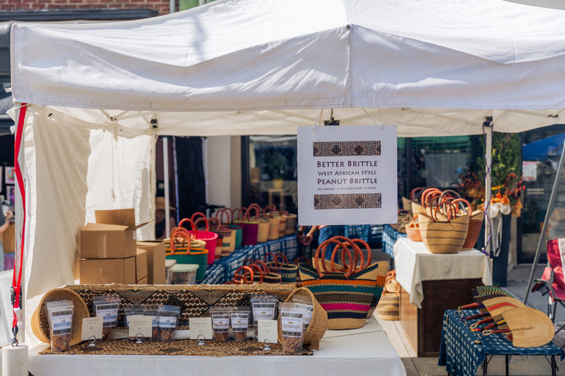 A local Syracuse shop sells freshly-made peanut brittle at the Westcott Street Cultural Fair. The Fair attracted a range of vendors who sold goods like handmade clothing, jewelry and various cuisines.
