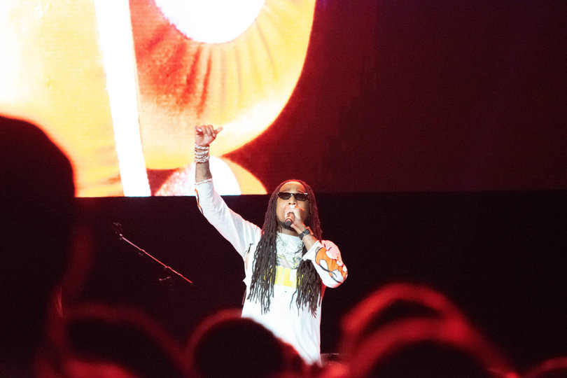 Quavo captures the audience with his presence. The stage’s vibrant background matched the electric energy he brought to his performance.
