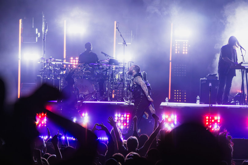 Swims and his guitarist jam out on stage. Fans matched their energy, with many jumping, raising their hands in their and making heart signs toward the musicians.
