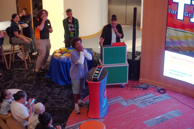 Students and parents compete head-to-head in a game show hosted by Orange After Dark. The game show event also included arts and crafts in the Schine Underground, a coffee lounge and board games.  

