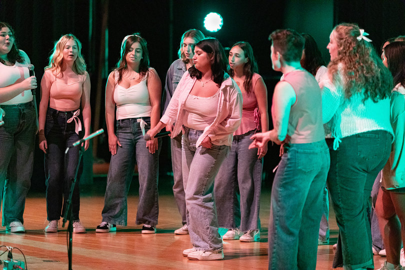 The Mandarins, one of SU’s a cappella groups, perform in Goldstein Auditorium. The group sang “Good Kisser” by Lake Street Dive and “Rocket Man” by Elton John. 
