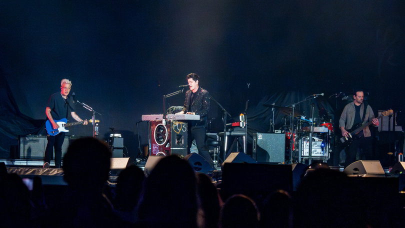 The Script, the first opener for P!nk, performs their hits like “Hall of Fame.” Audience members continued to file in as they played.
