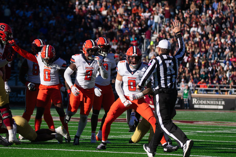 Syracuse defender Justin Barron flexes after a big defensive stop for the Orange. Barron tallied a game-high 11 tackles against BC. 
