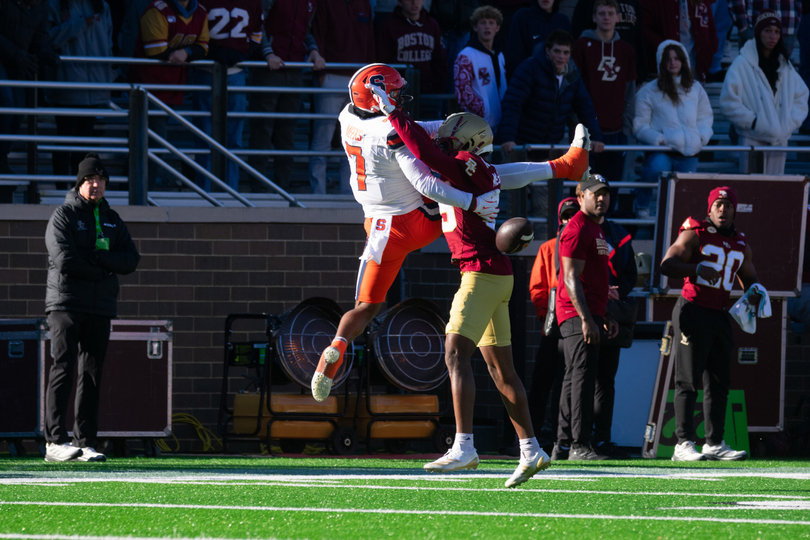 SU wide receiver Jackson Meeks attempts to make an acrobatic catch over a Boston College cornerback, but the ball gets knocked away. Meeks hauled in seven catches for 105 yards in the Orange’s loss to the Eagles. 
