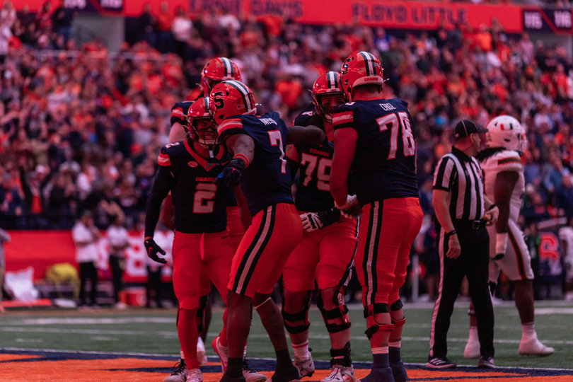 The Orange’s offense convenes after Jackson Meeks’ first touchdown score in the second quarter. SU tied for its second-most points this season with 42, matching its win over Holy Cross and falling just short of its 44 against UNLV.  
