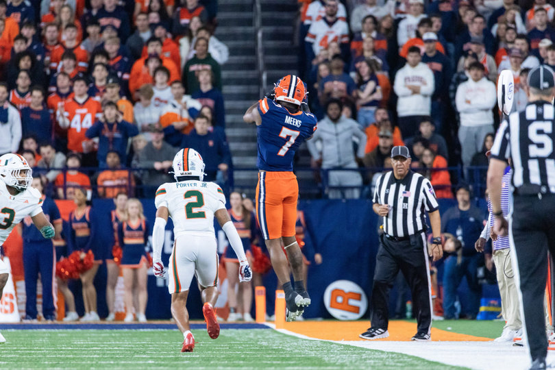 Syracuse wide receiver Jackson Meeks tip-toes the sideline to record a reception. Meeks finished his stellar senior year with style, scoring two pivotal touchdowns on seven receptions for 110 yards.
