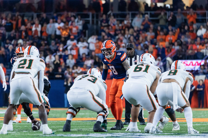 Linebacker Justin Barron rears over the Hurricanes’ offensive line in anticipation of the ensuing snap. Barron notched five total tackles and helped the Orange limit Miami's explosive offense to a few key stops. 
