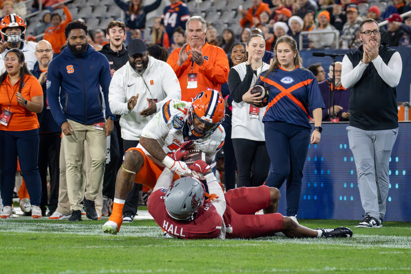 SU wide receiver Jackson Meeks secures a contested catch against WSU cornerback Stephen Hall. With his five-catch, 100-yard receiving night, Meeks became the first 1,000-yard receiver of the Fran Brown era.