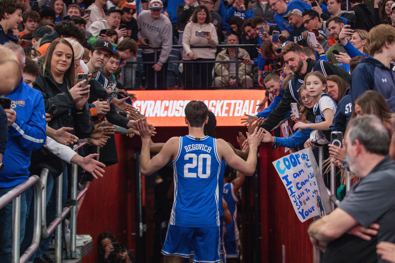 Duke walks off the court into the JMA Wireless Dome tunnel after a commanding 29-point win over SU. The win was the Blue Devils’ 16th straight this season and their 10th straight over the Orange. 