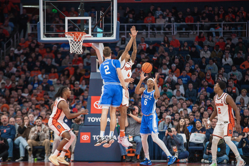 Cooper Flagg dishes to a wide-open Maliq Brown under the rim in the second half. The Blue Devils outscored the Orange 46-31 in the final 20 minutes.