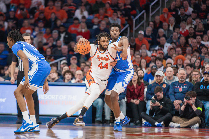 Eddie Lampkin Jr. drives inside against Duke freshman Patrick Ngongba II. Lampkin Jr., SU’s biggest transfer portal addition, finished with two points and seven rebounds.
