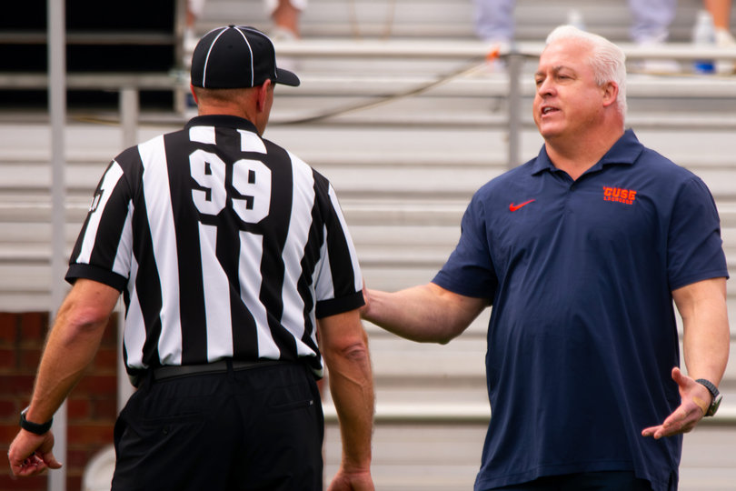 Syracuse head coach Gary Gait reasons with an official amid the Orange’s battle versus the Cavaliers. With SU’s win, Gait improved his record to 2-3 all-time when matched up against Virginia, a program led by two-time national champion head coach Lars Tiffany. 