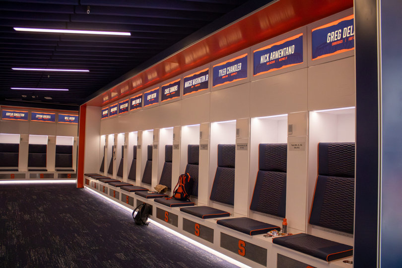 Each Syracuse player’s locker has their name, position and hometown listed above it. The locker room is also climate-controlled to keep all players healthy.