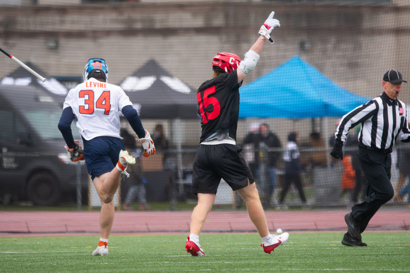 Cornell attack CJ Kirst raises his arm in exultation following a goal. Kirst, who leads the country with 4.90 goals per game, tormented Syracuse’s back line for five goals and three assists, showcasing his near-unstoppable shooting stroke and evasive movement. Kirst’s five-goal effort brought his career goal total to 219, five below the NCAA record set by Virginia’s Payton Cormier last season.