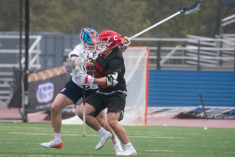 Cornell attack Ryan Goldstein (right) is defended by Syracuse’s Billy Dwan (left). After holding then-No. 5 Notre Dame scoreless for 40 minutes on April 5, the Orange struggled to contain the Big Red’s explosive offense, giving up a season-high 17 goals.