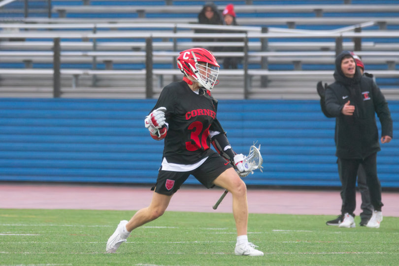 Cornell attack Ryan Goldstein pumps his first in celebration during the Big Red’s five-goal win over the Orange. Goldstein recorded eight points on three goals and five assists Saturday. 