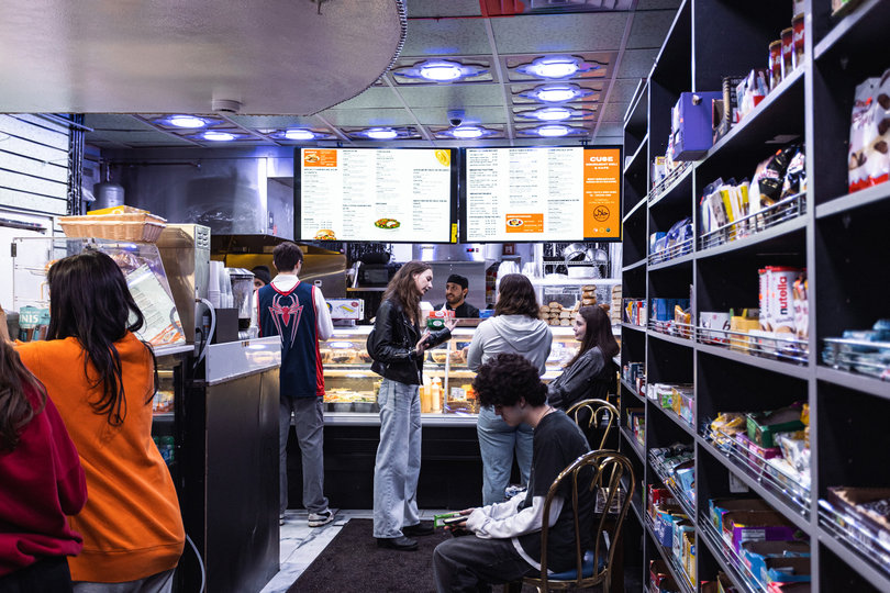 Customers come in and out of Cuse Gourmet Deli and Café at all hours of the night. The Daily Orange spent a night at the café to see how students and locals satisfy their nighttime cravings.