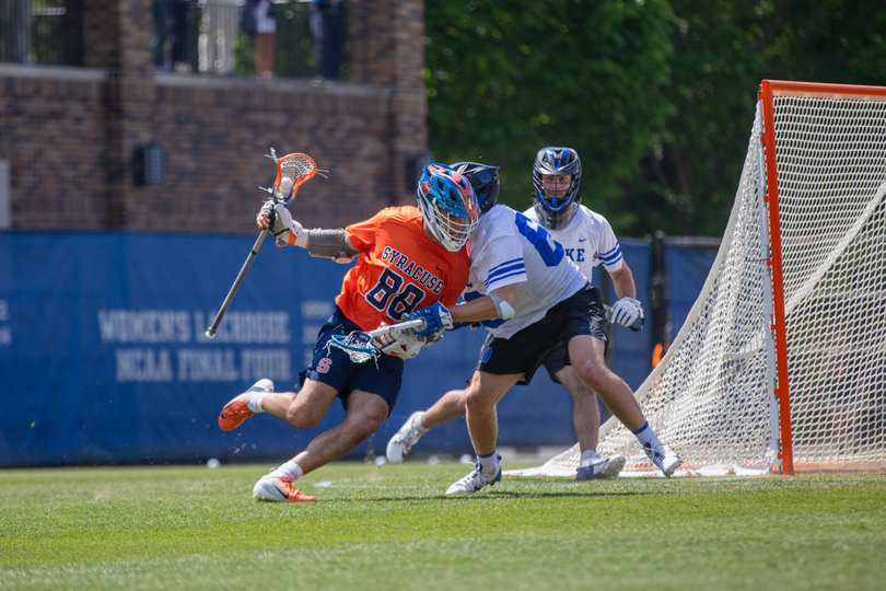 Syracuse freshman attack Payton Anderson (No. 88) tries to beat his defender around the corner and get an open look at goal. In his fourth straight start, Anderson struggled, coming away with no goals and committing a team-high four turnovers.