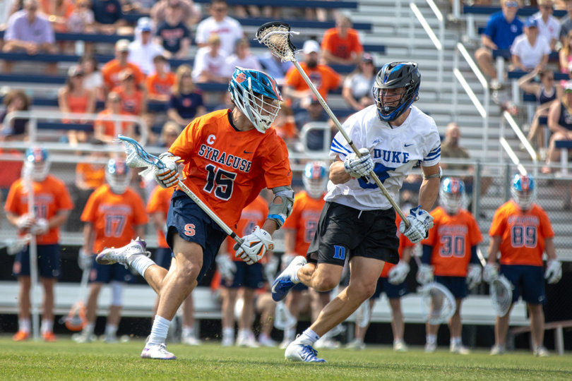 With Duke defender Henry Bard (No. 5) sticking to him closely, Syracuse midfielder Sam English (No. 15) motors downfield. English scored just one goal against the Blue Devils, marking the first time he had just one point since SU’s win over then-No. 7 Johns Hopkins on March 9.