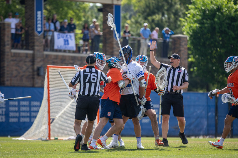 Duke midfielder Max Sloat has some words for Syracuse defender Chuck Kuczynski after things got physical near the end of the game. Kuczynski and Sloat’s skirmish capped SU’s defeat to Duke, which saw the Blue Devils dominate the first and third quarters.