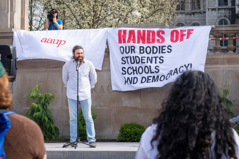 Syracuse University’s chapter of the American Association of University Professors organized Thursday’s “Hands Off!” protest. Several faculty members and students spoke about their experiences and concerns to the crowd.