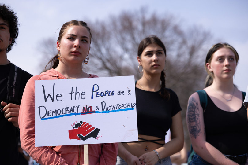Protesters call for protecting democracy. Faculty and students expressed fear in unprecedented times.