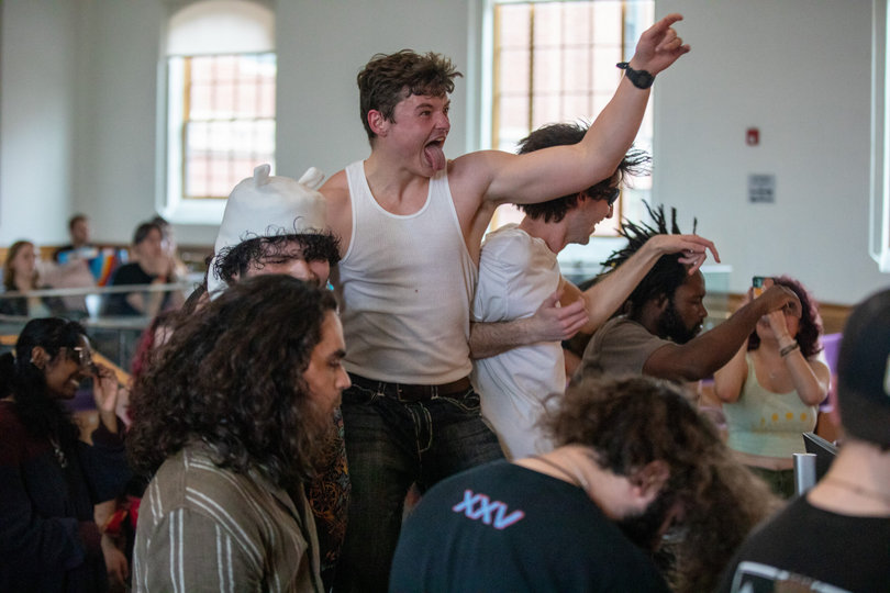 Students jump up and down as they rock out to The Schwegs. The band brought a mix of modern and classic rock to the stage. 