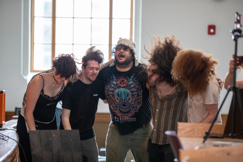 Fans and artists jam out to The Schwegs together. The SUNY ESF Music Society hosted the performance as a finale for Earth Week. 