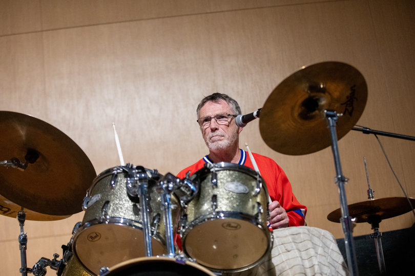 Acid Reign’s drummer grooves out during the band’s set. He brought a range of talents, from playing the drums to singing back-up vocals.