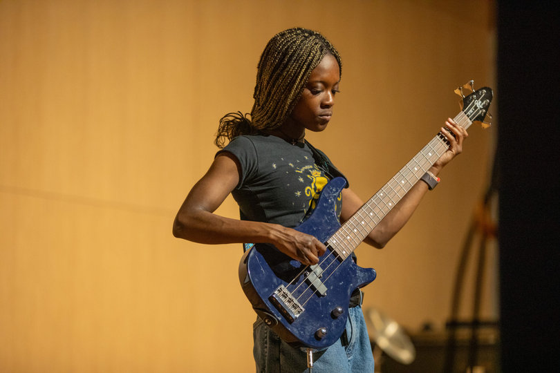 Gaby Cardichon plays bass for the band Prom. The band also performed at Redfest later the same weekend.