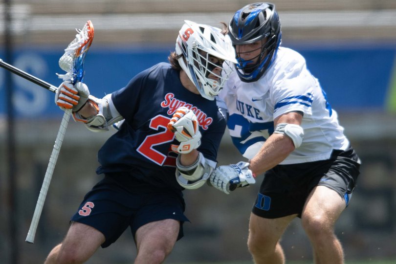 Joey Spallina shoves Duke defenseman Charlie Johnson. Spallina’s three points against Duke marked his lowest tally since April 12, when he only notched one point against Cornell.